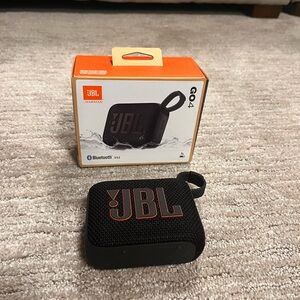 JBL GO 4 Bluetooth Speaker - Black with Orange Highlights